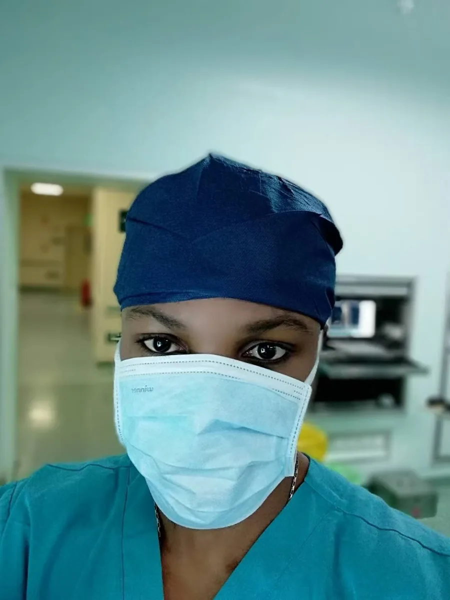 Dr. Vithran in the operating theatre